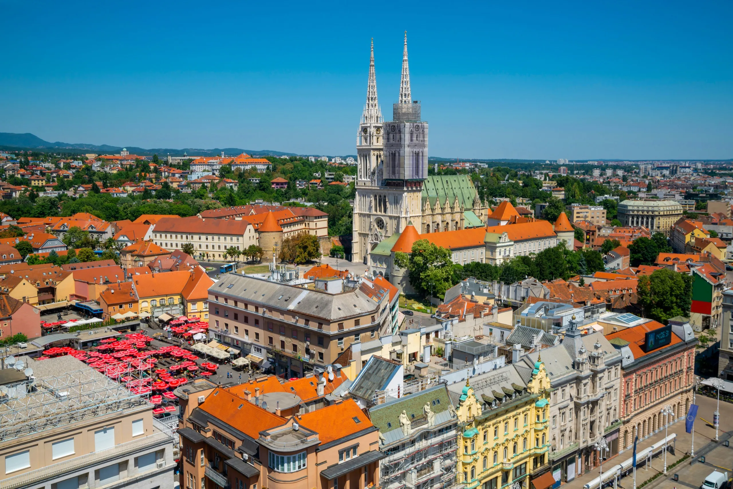 Aerial view of Zagreb: Ban Jelačić Square, the red rooftops of the old town, and the cathedral's twin spires